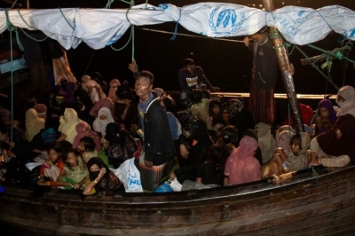120 Rohingya Refugees Disembark From Boat in Indonesian Port
